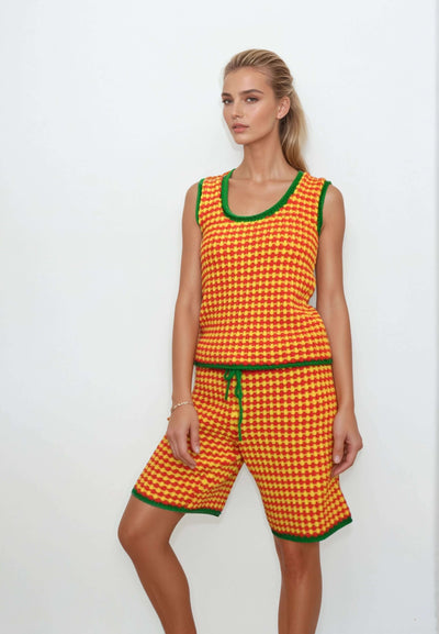 Colorful 2-piece knit set for women featuring a checkered tank top and shorts in yellow, red, and green for summer festivals.