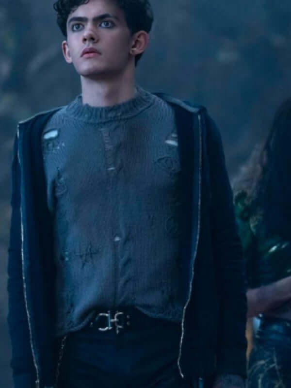 Distressed Agatha All Along Joe Locke sweater in a punk outfit, featuring holes and embroidery details.