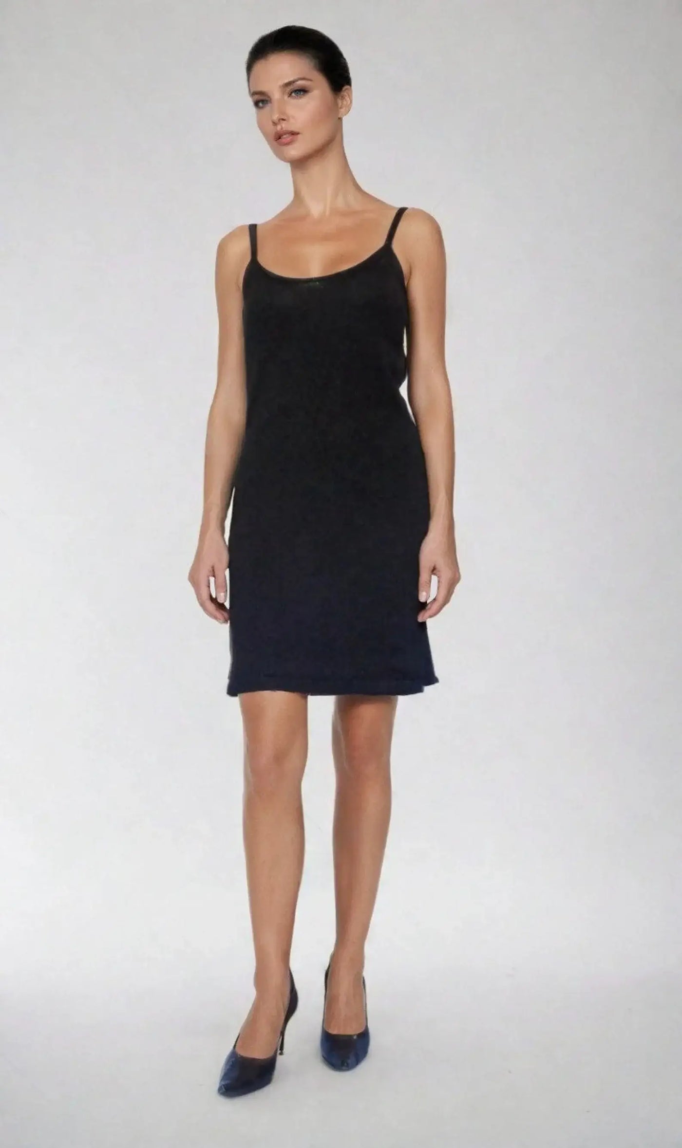 Black spiderweb open back dress with spaghetti straps, knitted fabric, form-fitting A-line, perfect for edgy elegance.