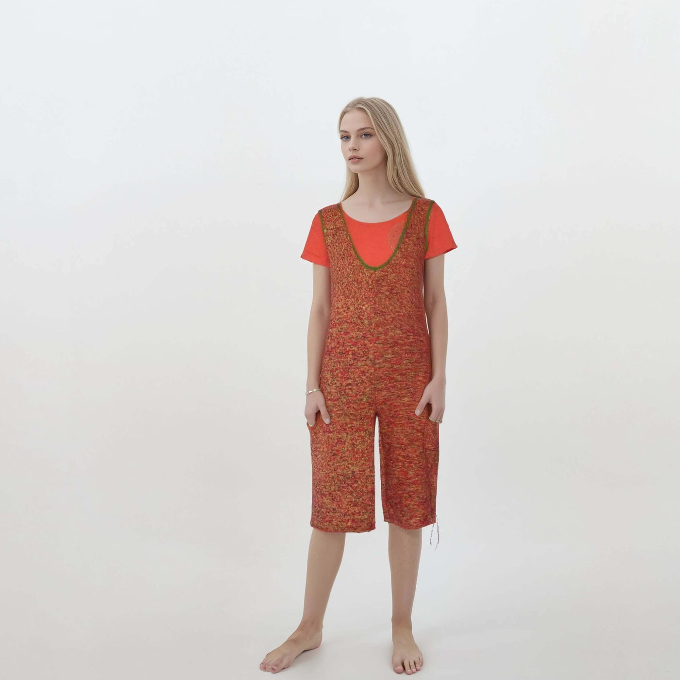 Knitted  jumpsuit shorts with v-neck and pockets in vibrant color gradient, featuring tie details and relaxed fit for streetwear style.