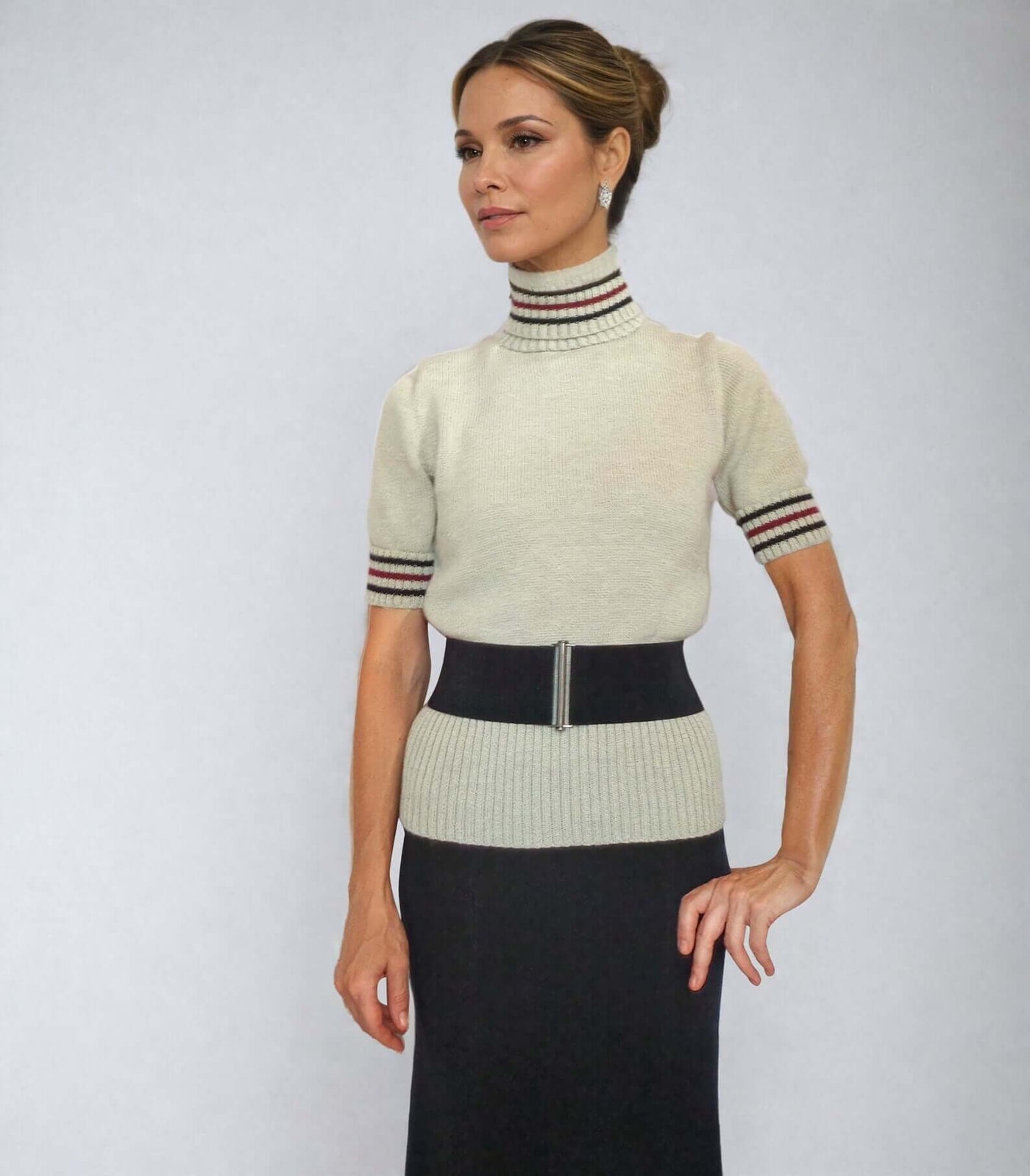 Marilyn Monroe-inspired pink sweater replica with striped cuffs and high collar from Hometown Story, 1951.
