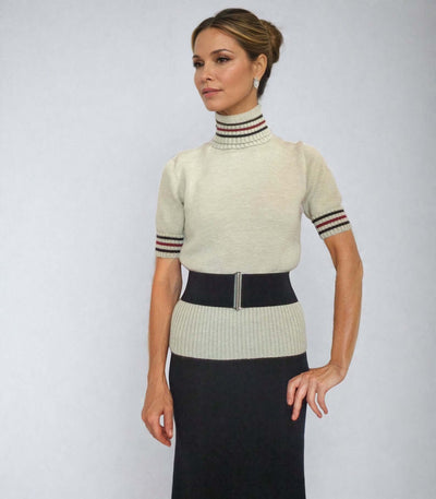 Marilyn Monroe-inspired pink sweater replica with striped cuffs and high collar from Hometown Story, 1951.