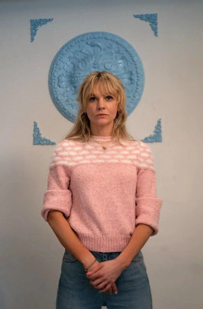 Honeycomb pink sweater inspired by Promising Young Woman, worn by Carey Mulligan, showcasing a chic women's knitwear style.