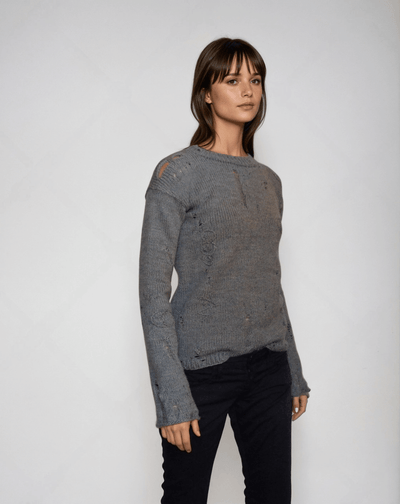 Distressed punk sweater inspired by Agatha Harkness, featuring cable knit design and embroidered details, handmade in grey.