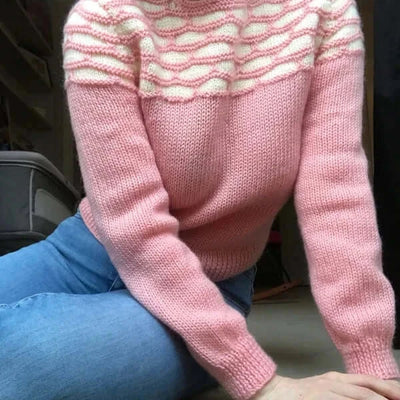 Honeycomb pink sweater inspired by Promising Young Woman, featuring soft mohair blend for women's knitwear.