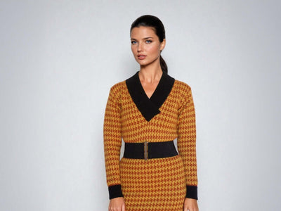 Marilyn Monroe-inspired black and brown check knee-length dress with shawl collar, A-line cut, and knitted fabric.