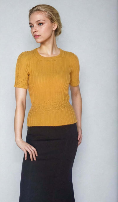 Women in a handmade yellow mustard cable knit sweater top, inspired by the iconic Bonnie and Clyde movie.