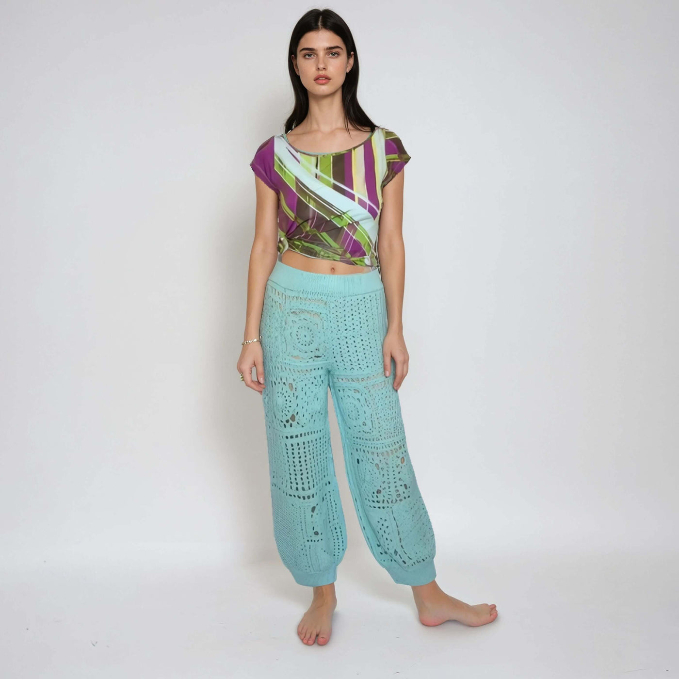 crochet turquoise harem pants with granny square mesh pattern, showcasing a boho style and relaxed fit.